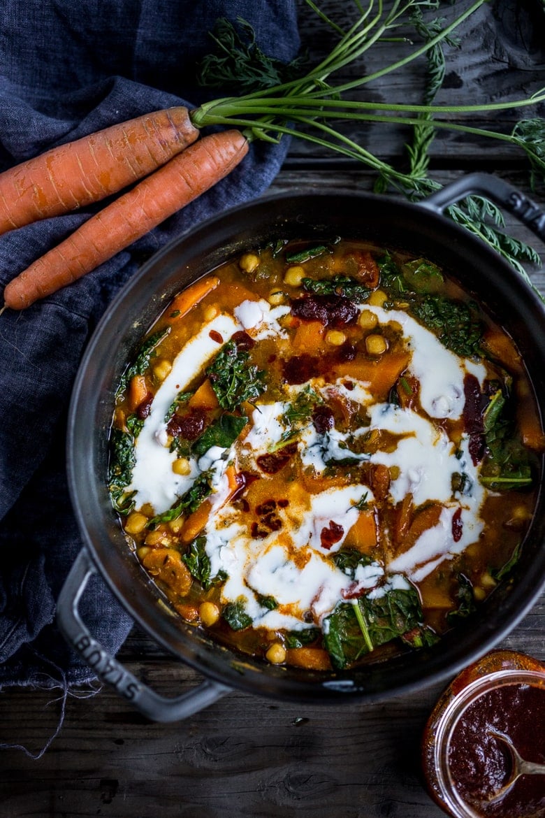 Tunisian Chickpea Stew with Carrot and tops, turmeric, kale and "quick Harissa". | www.feastingathome.com