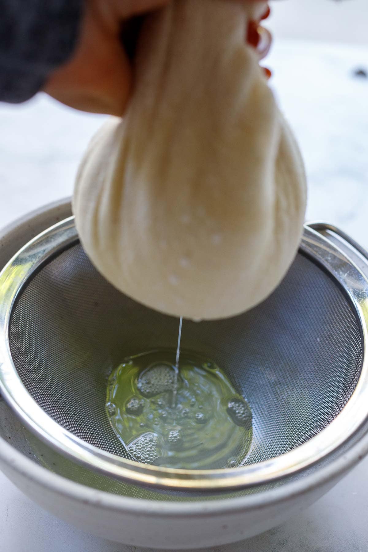 straining the yogurt. 