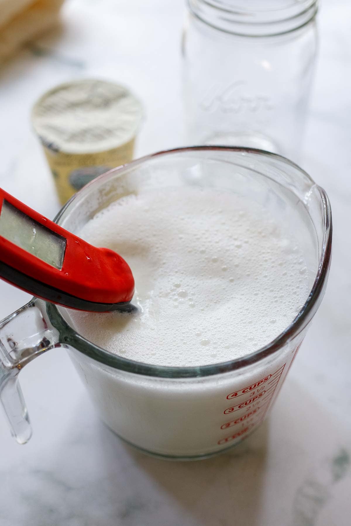 cooling the milk to 110F. 