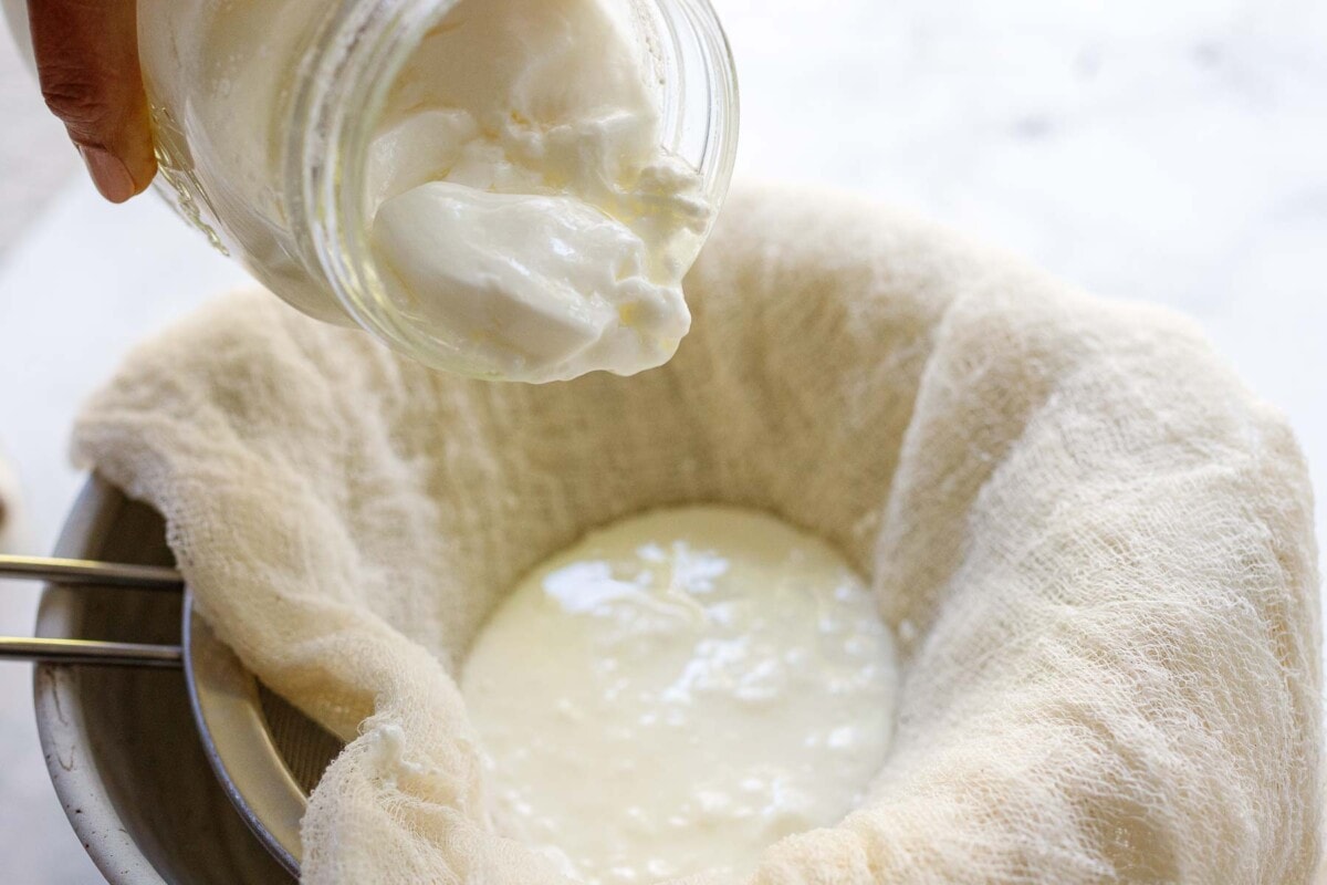 Straining the yogurt.