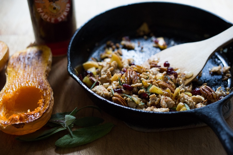 Thanksgiving Stuffed Butternut with ground turkey, sage, apples, cranberries and pecans. | www. feastingathome.com