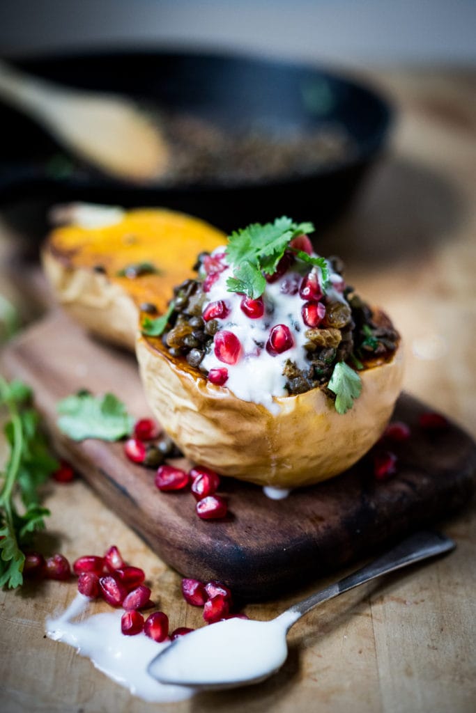  Stuffed Butternut with Persian Lentils, dried fruit, yogurt, pomegranate and cilantro. Vegetarian, gluten free. | www.feastingathome.com