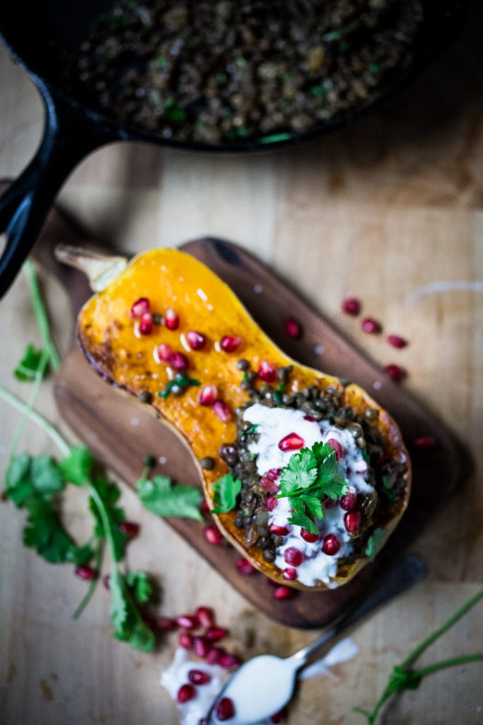  Stuffed Butternut with Persian Lentils, dried fruit, yogurt, pomegranate and cilantro. Vegetarian, gluten free. | www.feastingathome.com