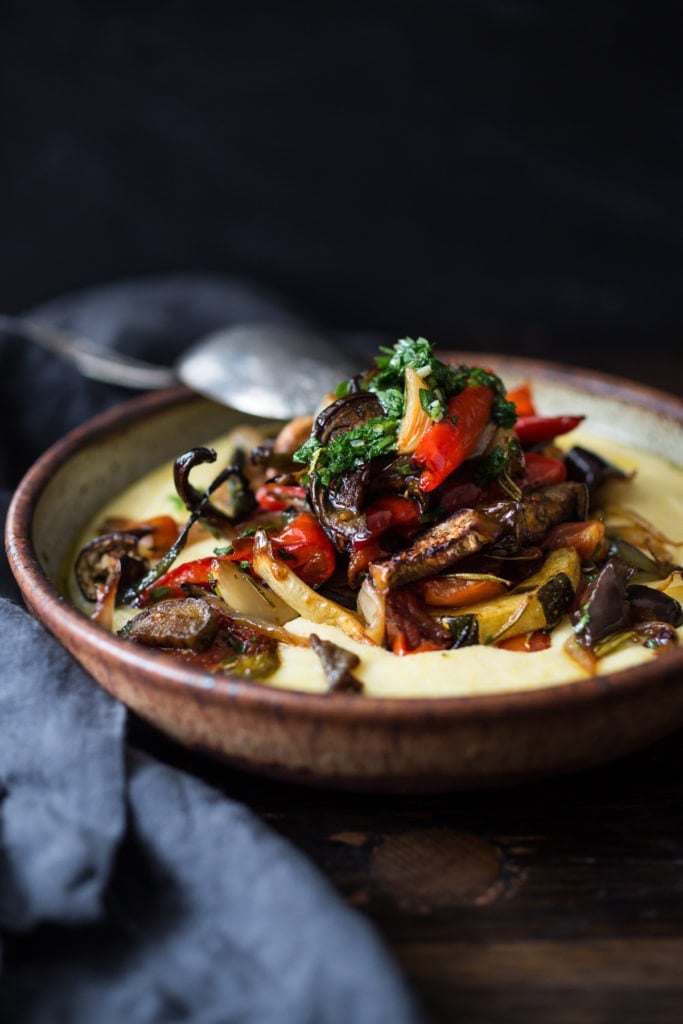 Baked Sheet-Pan Ratatouille with eggplant, zucchini and peppers is easy, healthy and vegan! Bake a big batch on Sunday then serve it during the busy workweek over pasta, polenta or even toast!