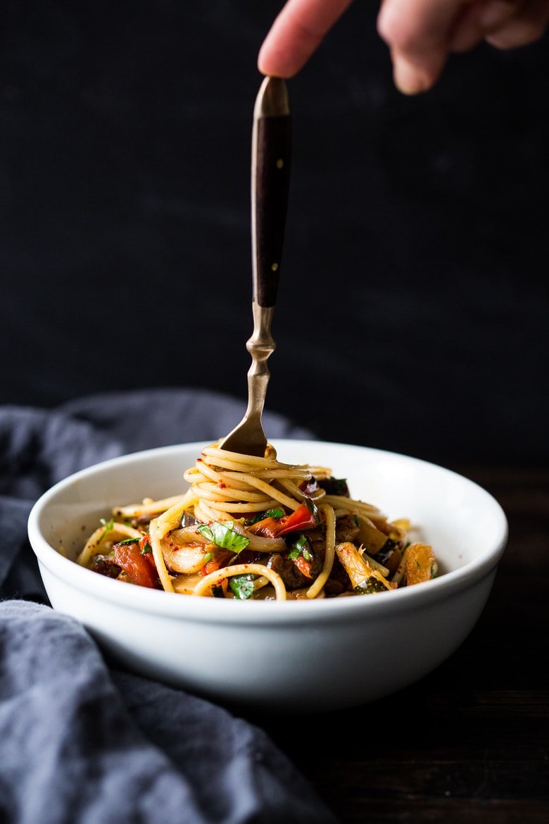 20 Healthy Pasta Recipes: A simple vegan pasta recipe -Roasted Ratatouille Pasta- loaded up with end of summer veggies that are roasted in the oven. #ratatouille #sheetpan #veganpasta #healthypasta | www.feastingathome.com