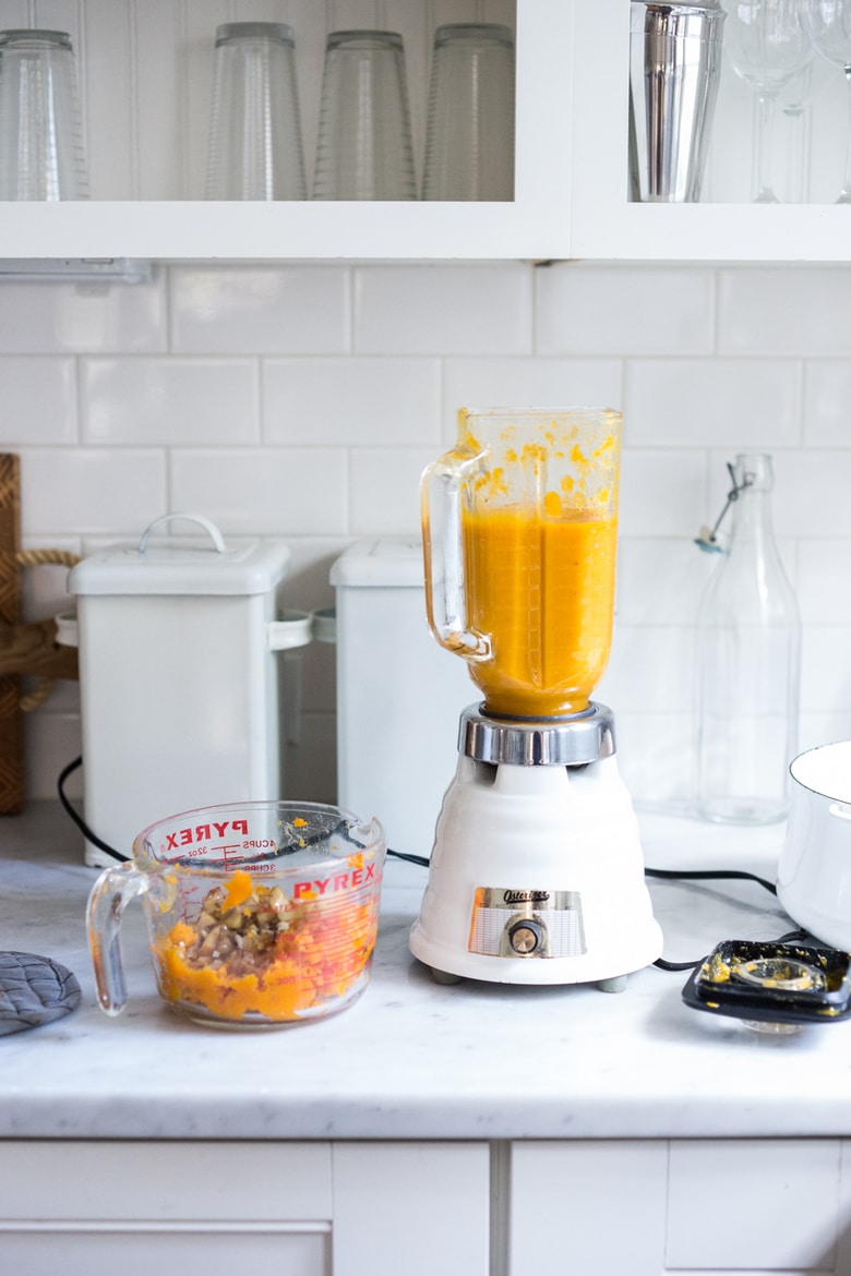 Blending the butternut squash soup in blender