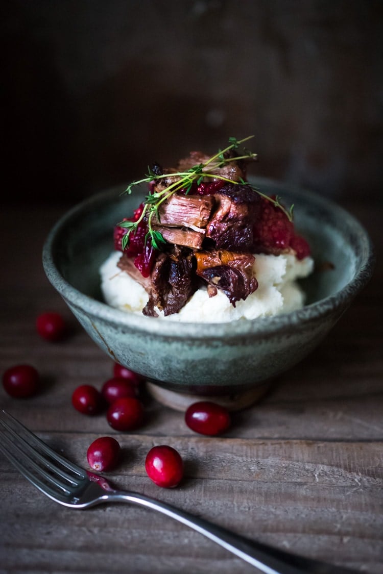 Cranberry Pot Roast - a simple festive recipe for beef roast, baked with fresh cranberries and roasted in the oven- tender, juicy and flavorful! Perfect for the holidays or a simple Sunday super.  #potroast #cranberries #cranberryrecipes #beef #beefroast #holidayrecipes #easy