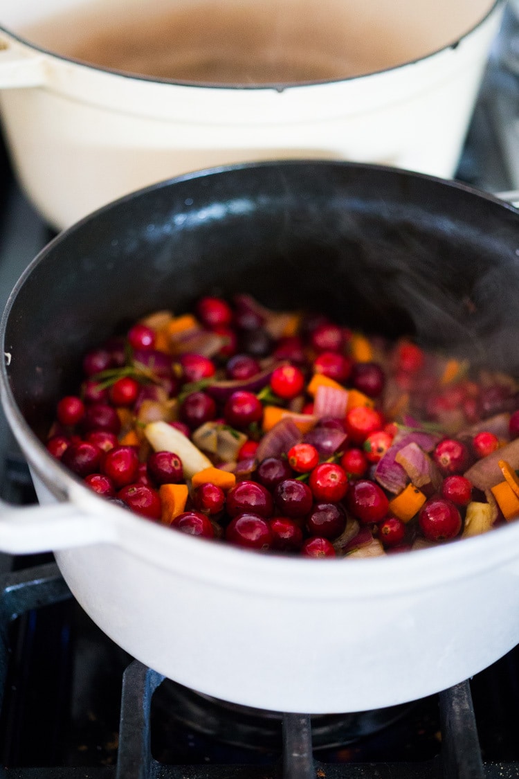 Cranberry Pot Roast - a simple festive recipe for beef roast, baked with fresh cranberries and roasted in the oven- tender, juicy and flavorful! Perfect for the holidays or a simple Sunday super. #potroast #cranberries #cranberryrecipes #beef #beefroast #holidayrecipes #easy