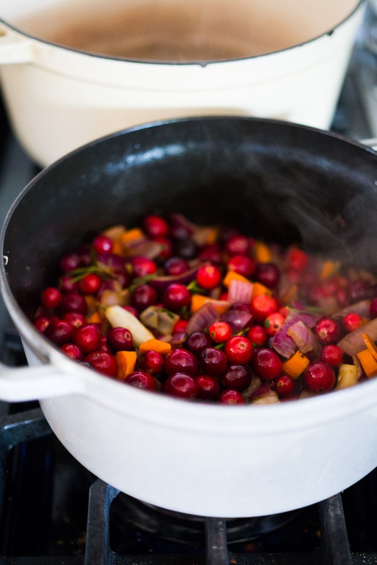 Cranberry Pot Roast - a simple festive recipe for beef roast, baked with fresh cranberries and roasted in the oven- tender, juicy and flavorful! Perfect for the holidays or a simple Sunday super.  #potroast #cranberries #cranberryrecipes #beef #beefroast #holidayrecipes #easy 