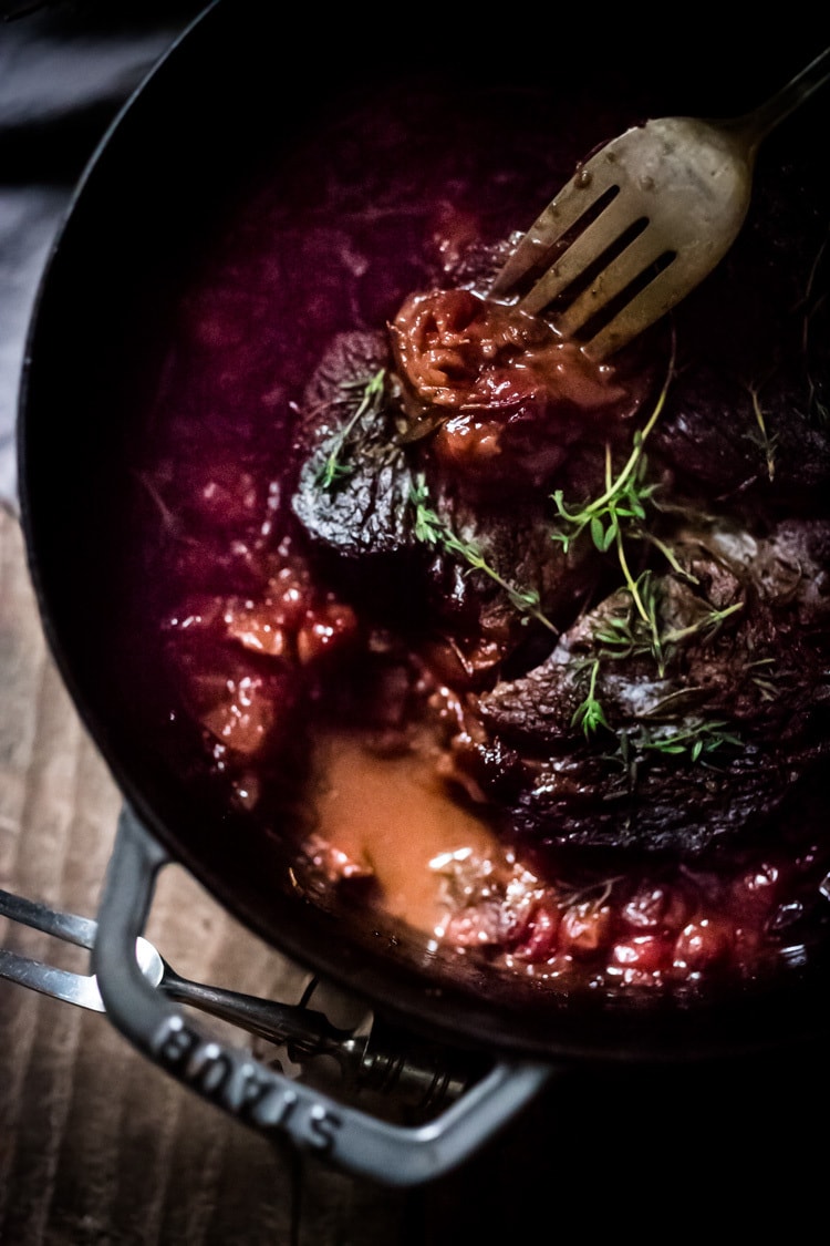 Cranberry Pot Roast - a simple festive recipe for beef roast, baked with fresh cranberries and roasted in the oven- tender, juicy and flavorful! Perfect for the holidays or a simple Sunday super.  #potroast #cranberries #cranberryrecipes #beef #beefroast #holidayrecipes #easy 