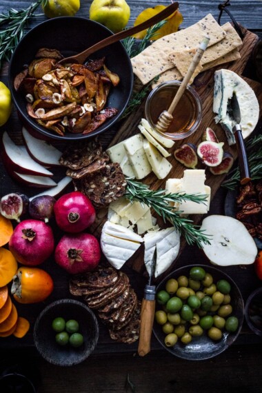 Simplify your holiday gatherings with this Thanksgiving Cheese Board w/ Honey Roasted Quince- an easy guide on how to create a simple, elegant cheese board.