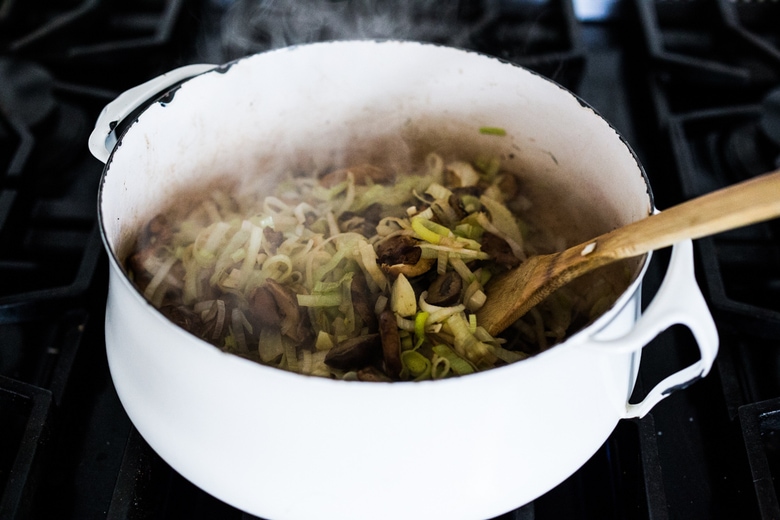 Wild Mushroom Stuffing with fennel and leeks -  a tasty vegetarian Thanksgiving Side Dish that is full of depth and flavor flavors.  Vegan adaptable! #stuffing #vegan #mushroomstuffing #vegetariansidedish #thanksgivingsidedish