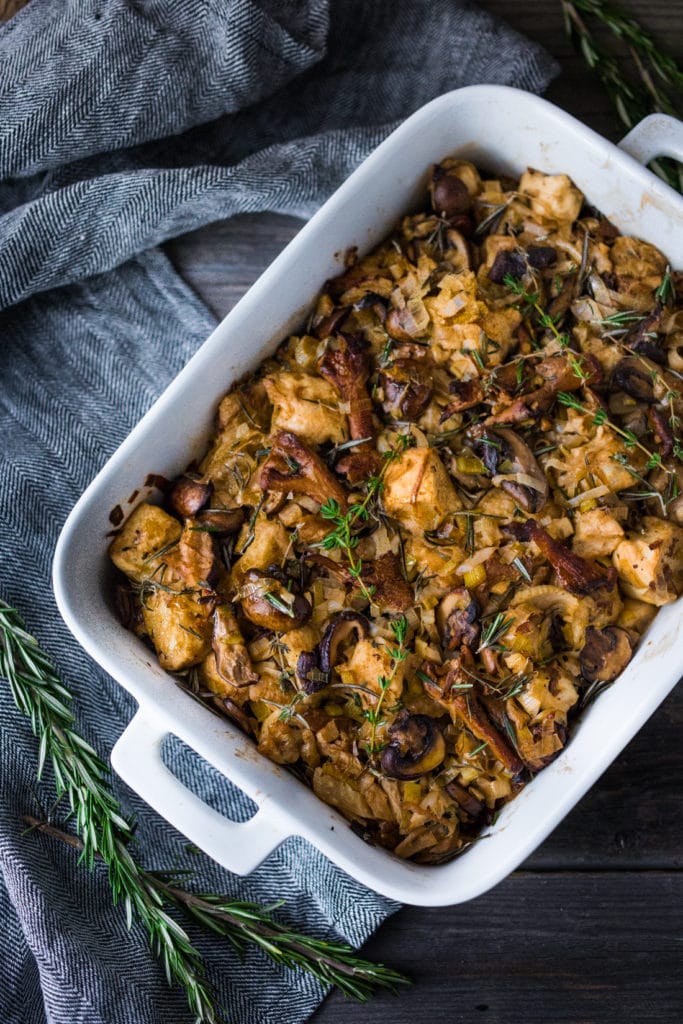 Packed full of mushrooms, leeks and thyme, this Mushroom Stuffing recipe is so savory and delicious! A tasty vegetarian side dish full of depth and umami flavor, perfect for the holiday table, or as a hearty vegetarian main. Vegan-adaptable!