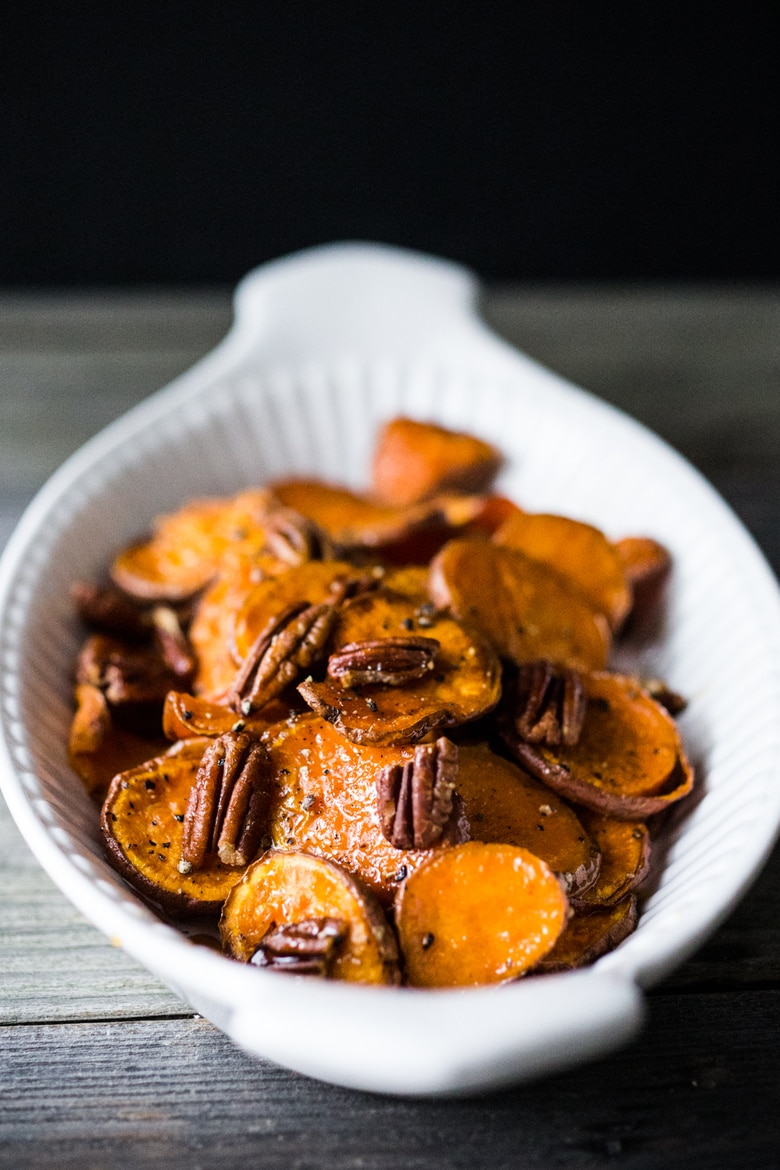 Maple Roasted Yams with Pecans- a simple vegan and gluten free side dish that can be made in 30 minutes | www.feastingathome.com