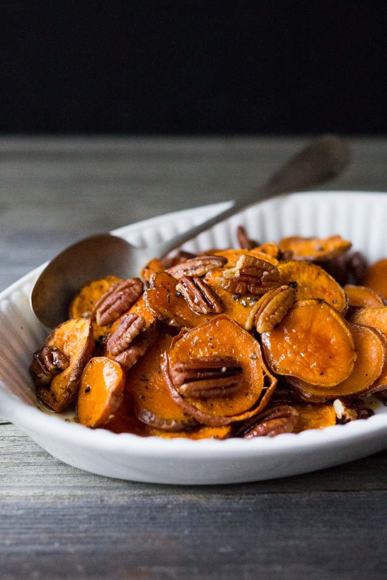Maple Roasted Yams with Pecans- a simple vegan and gluten free side dish that can be made in 30 minutes | www.feastingathome.com