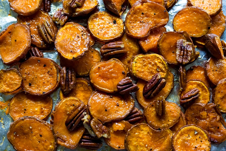 Maple Roasted Yams with Pecans- a simple vegan and gluten free side dish that can be made in 30 minutes | www.feastingathome.com