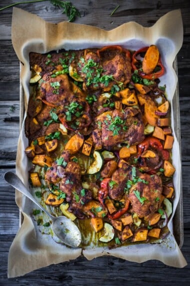 Baked Tandoori Chicken (or Tofu) with "clean-out-your-fridge veggies" and flavorful tandoori marinade, all cooked on a sheet-pan. Delicious, healthy recipe! Vegetarian Adaptable!