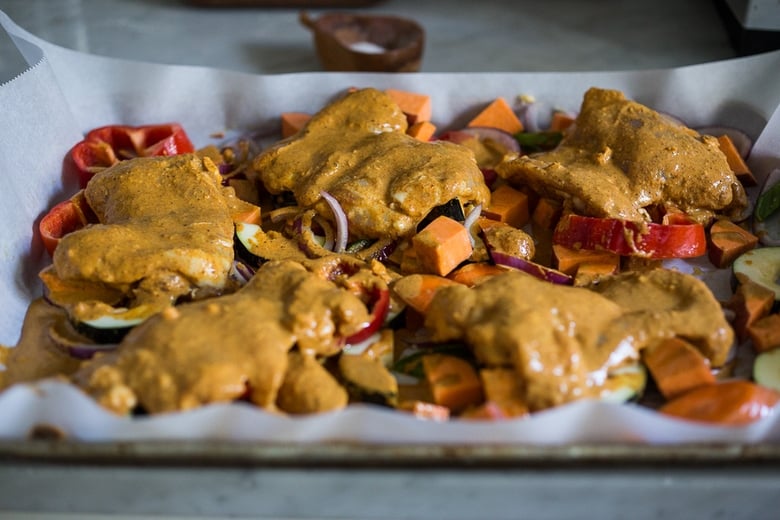 Baked Tandoori Chicken (or Tofu) with "clean-out-your-fridge veggies" and flavorful tandoori marinade, all cooked on a sheet-pan. Delicious, healthy recipe! Vegetarian Adaptable! #tandoorichicken #bakedtandoorichicken #tandooritofu