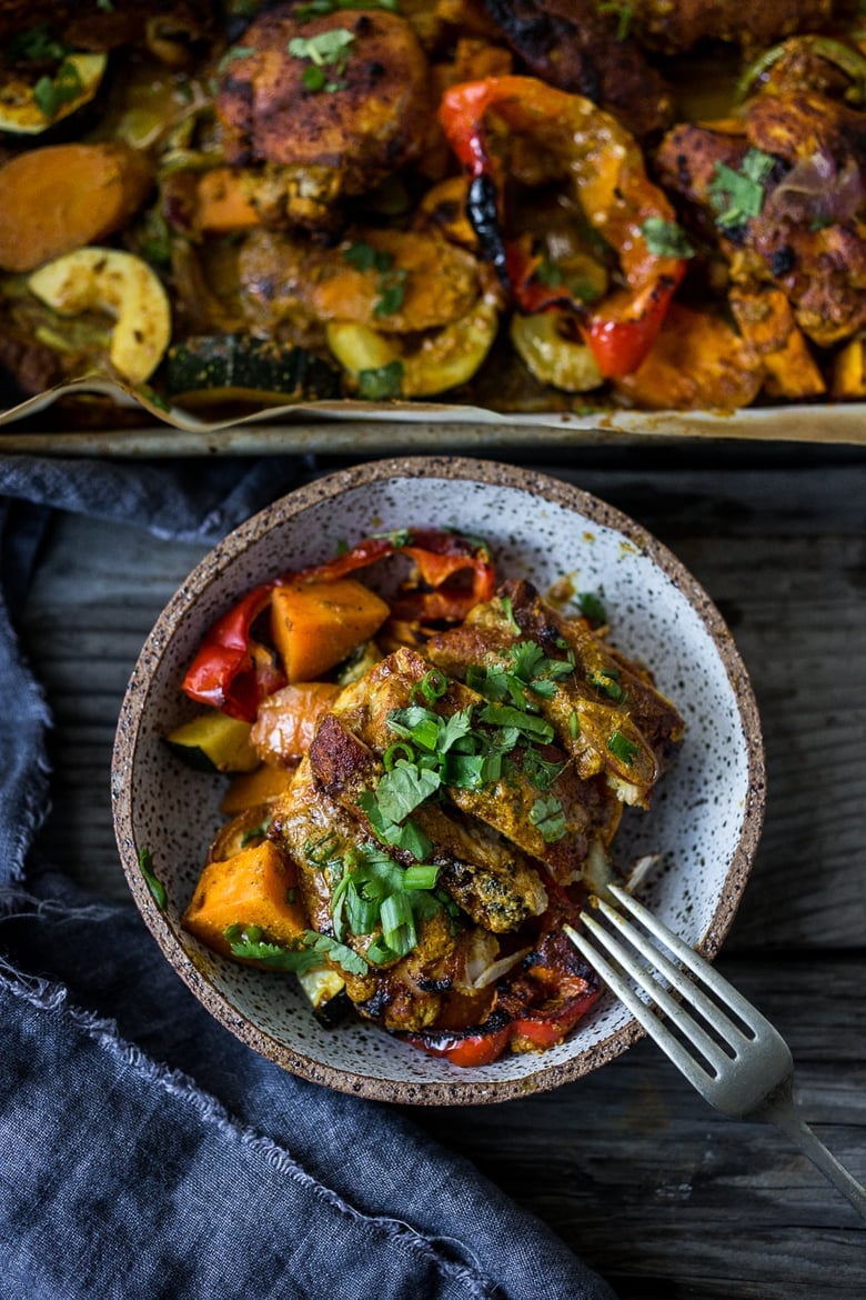 Baked Tandoori Chicken (or Tofu) with "clean-out-your-fridge veggies" and flavorful tandoori marinade, all cooked on a sheet-pan. Delicious, healthy recipe! Vegetarian Adaptable! #tandoorichicken #bakedtandoorichicken #tandooritofu