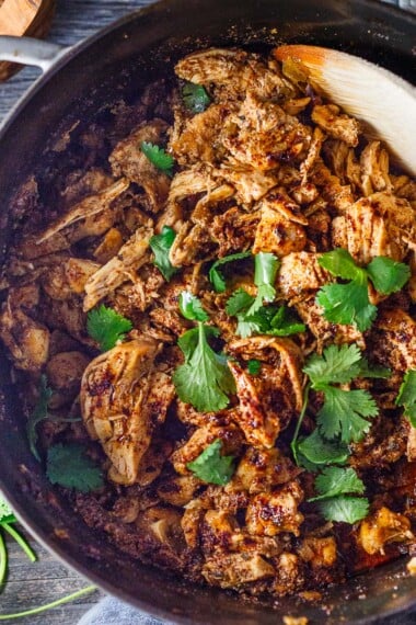 chicken carnitas in a dutch oven.