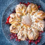  This cardamom-scented Star Bread recipe is so much fun to make! Deliciously fragrant, tender sweet bread, is studded with almonds and dried cranberries, perfect for holiday brunch or afternoon tea.