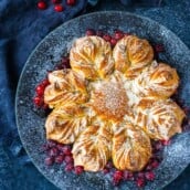  This cardamom-scented Star Bread recipe is so much fun to make! Deliciously fragrant, tender sweet bread, is studded with almonds and dried cranberries, perfect for holiday brunch or afternoon tea.