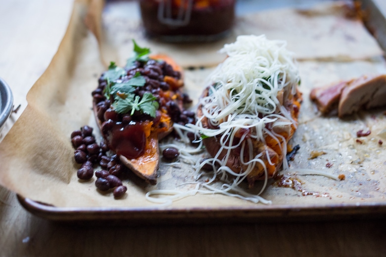 BBQ Stuffed Sweet Potatoes with your choice of chicken or black beans. Top with melty cheese or keep it vegan with avocado! 