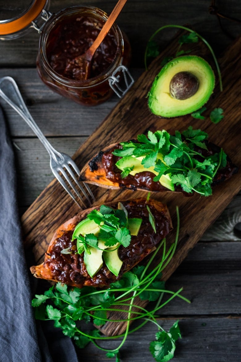 Baked Sweet Potatoes with BBQ Chicken ( or Black beans) or both! Perfect for mixed households who have meat-lovers, vegetarians, vegans, and gluten-free folks all living under the same roof. Customizable and adaptable! | #bakedsweetpotato | www.feastingathome.com