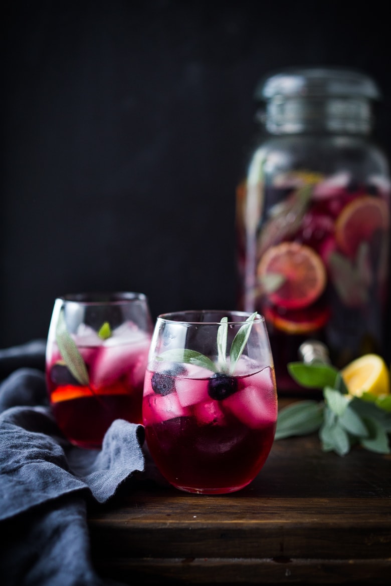 Blueberry Gin and Sage Punch -A refreshing make ahead, holiday punch, with lemon and prosecco, sparkling and effervescent. | www.feastingathome.com