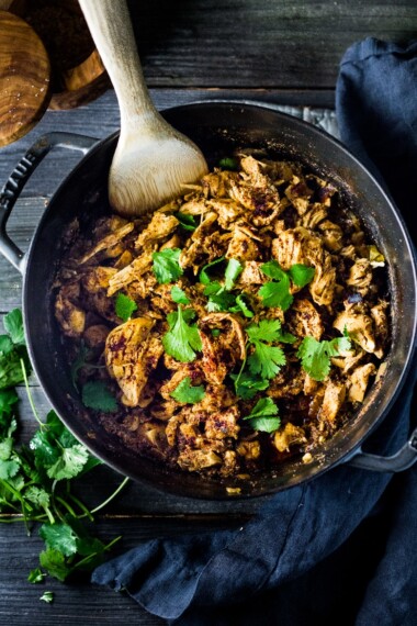 Dutch Oven Chicken Carnitas- make on Sunday, then serve 3 ways during the workweek! | www.feastingathome.com