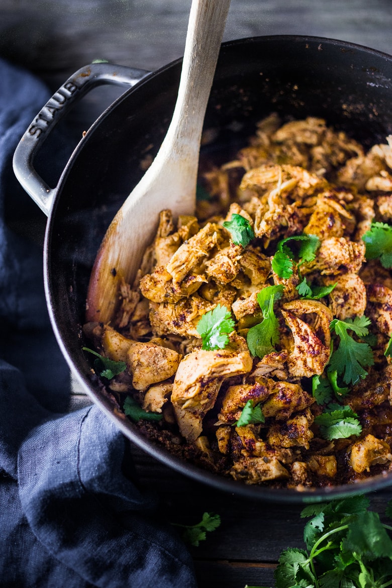 Simple Chicken Carnitas! Make this in an Instant Pot, or on the stovetop or in the oven and use in enchiladas, tacos, burrito bowls during the week. EAsy and delicious! 