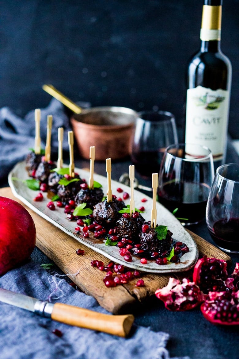 Moroccan Meatballs with Pomegranate Glaze- a festive holiday appetizer ( or turn into a meal) that can be made ahead! | www.feastingathome.com #Cavitwines #LivetheCavitLife