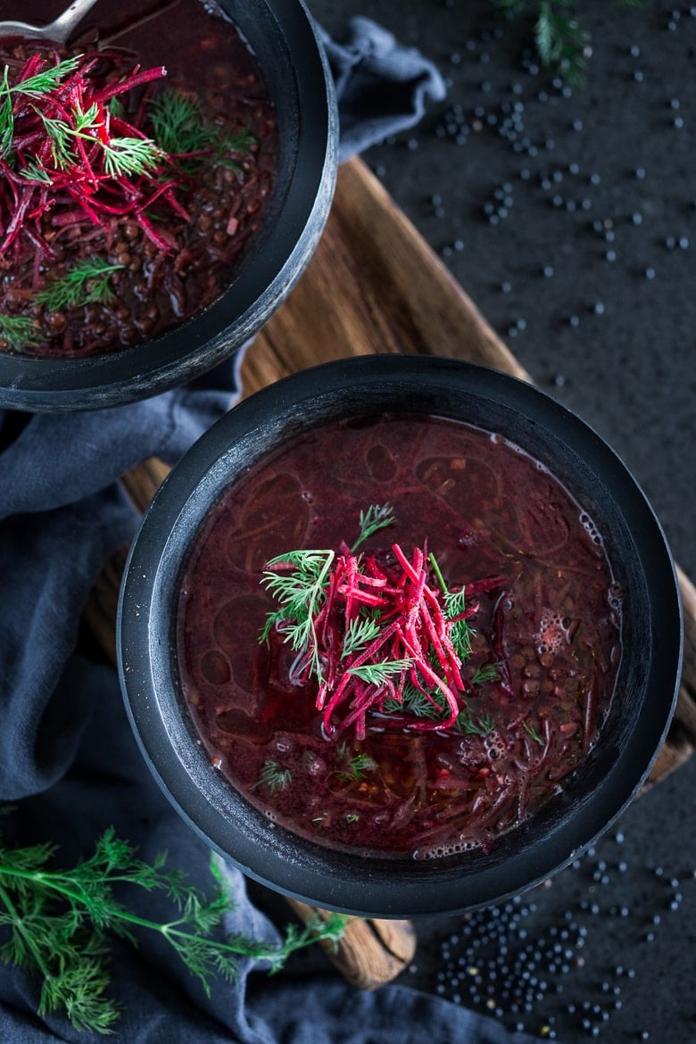 This healing Lentil Beet Soup is vegan, low-calorie,  and packed full of powerful antioxidants that gently aid the liver in healing the body. #detoxsoup #lentilsoup #vegansoup #beetsoup #detoxbroth #cleaneating #eatclean #plantbased | www.feastingathome.com