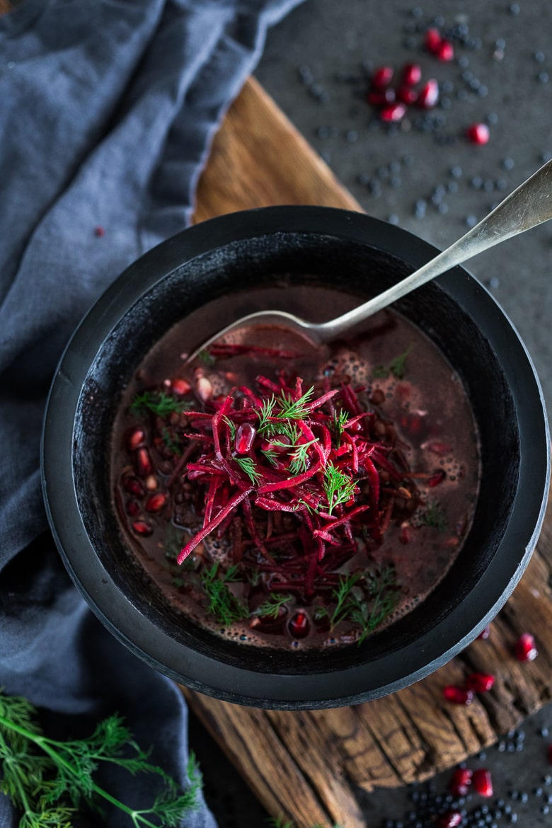 This healing Lentil Beet Soup is vegan, low-calorie,  and packed full of powerful antioxidants that gently aid the liver in healing the body. #detoxsoup #lentilsoup #vegansoup #beetsoup #detoxbroth #cleaneating #eatclean #plantbased | www.feastingathome.com