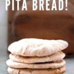 How to make fluffy delicious pita bread at home that turns out puffed and golden every time! #pita #pitabread #bread #pitarecipe