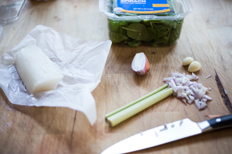 Poached Cod in Lemongrass Broth over Baby Spinach ...a fragrant, healing bowl that can be made in under 30 minutes. GF, Low Carb. | www.feastingathome.com