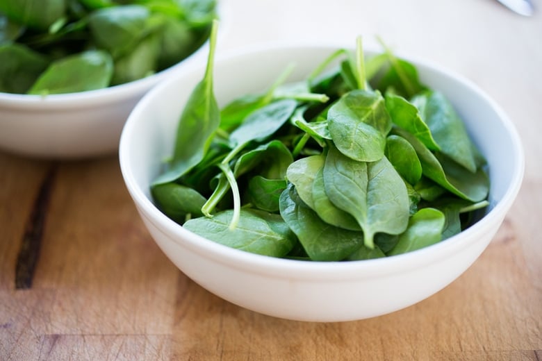 Poached Cod in Lemongrass Broth over Baby Spinach ...a fragrant, healing bowl that can be made in under 30 minutes. GF, Low Carb. | www.feastingathome.com