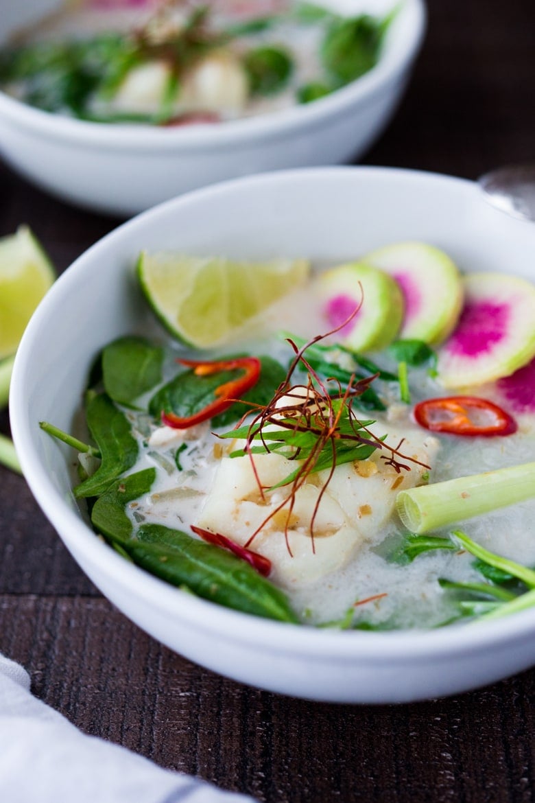 10 HEALING BROTH BASED SOUPS to nurture, comfort and help build immunity. Lemongrass Coconut Broth with Cod and Spinach | www.feastingathome.com