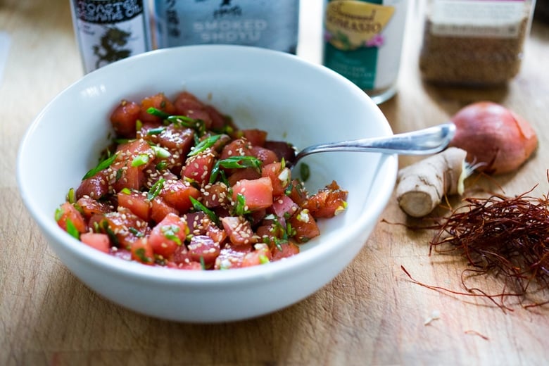 Poke Recipe - made with ahi tuna (or TOFU!) served over brown rice or kelp noodles, with avocado, cucumber, radish and Citrus Ponzu Sauce! | www.feastingathome.com