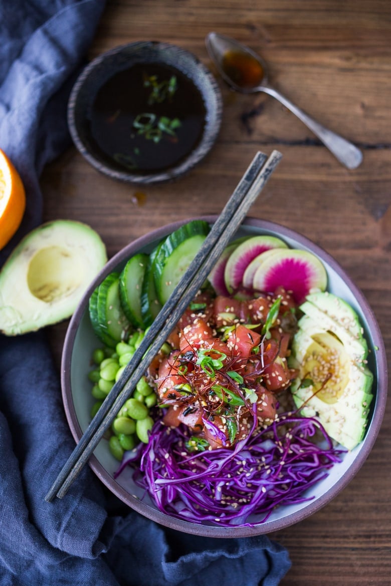 Healthy Poke Bowl- made with ahi tuna (or TOFU!) served over brown rice or kelp noodles, with avocado, cucumber, radish and Citrus Ponzu Sauce! | www.feastingathome.com