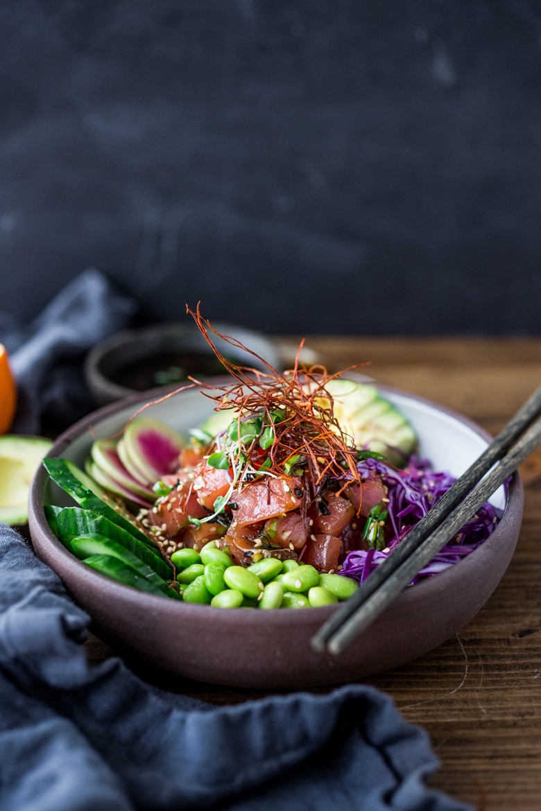  Poke Recipe - made with ahi tuna served over brown rice or kelp noodles, with avocado, cucumber, radish and Citrus Ponzu Sauce! | www.feastingathome.com