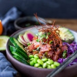 Poke Bowl- made with fish (or TOFU!) seasoned with sesame oil, over rice or keep noodles, surrounded with healthy veggies and citrus ponzu sauce! | www.feastingathome.com