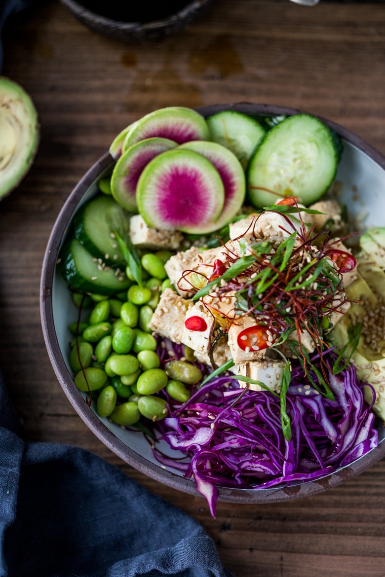 Vegetarian Poke Bowl- made with TOFU! Served over brown rice or kelp noodles, with avocado, cucumber, radish and Citrus Ponzu Sauce! | www.feastingathome.com