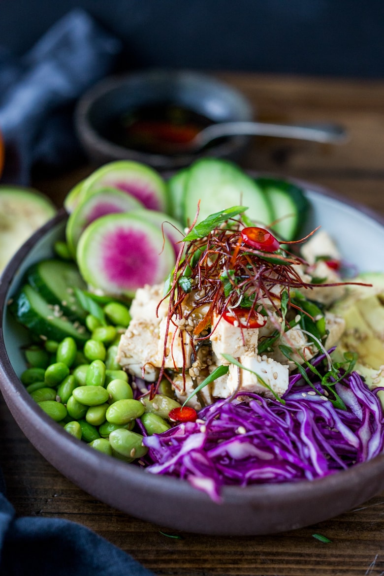 Healthy Poke Bowl- made with ahi tuna (or TOFU!) served over brown rice or kelp noodles, with avocado, cucumber, radish and Citrus Ponzu Sauce! | www.feastingathome.com