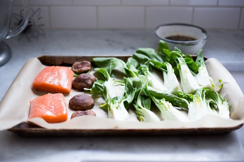 Salmomnand bok choy on a sheet pan.