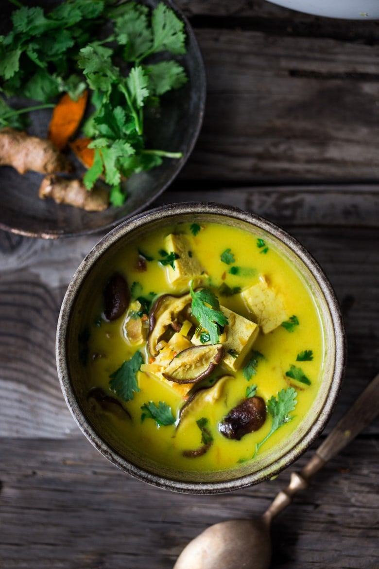 soup bowl with tofu curry, shiitakes, cilantro.