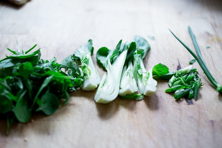 fresh greens for chicken meatball soup- arugula, bok choy, scallions.