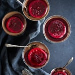 Creamy, silky Dark Chocolate Panna Cotta, rich and satisfying, yet not overly sweet. Vegan- adaptable and can be made ahead!
