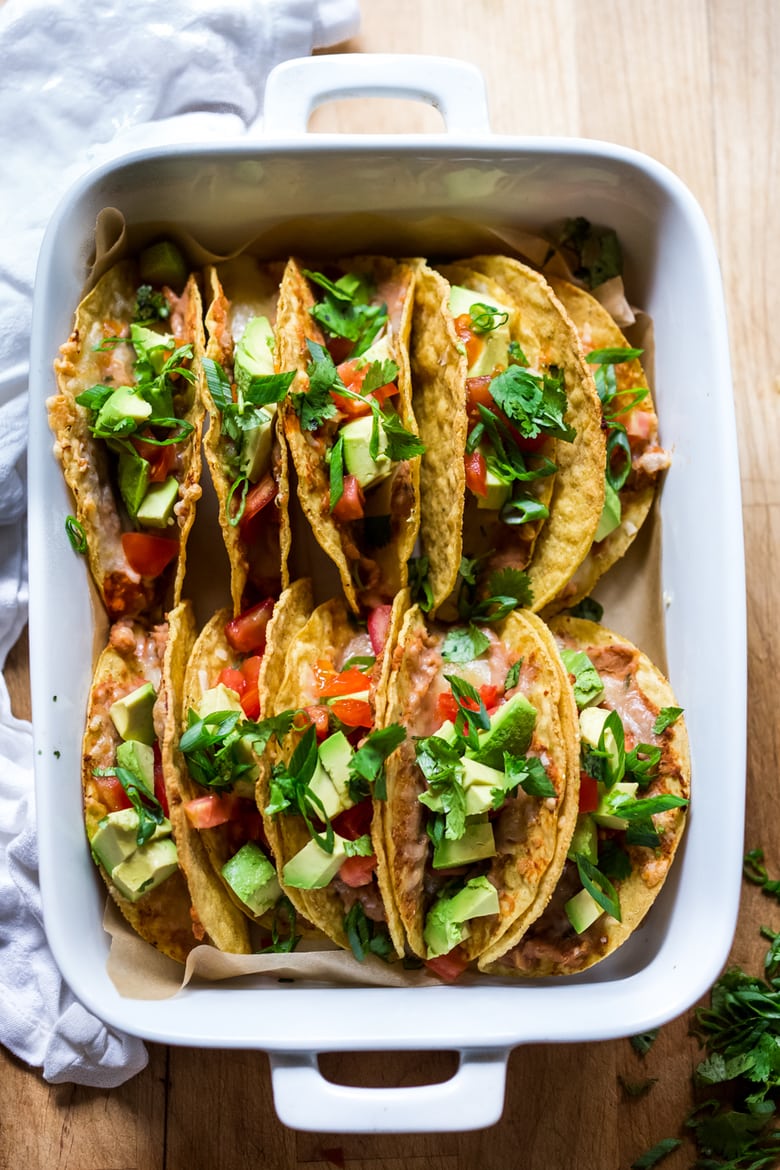 Healthy Baked Vegetarian Tacos - Kid friendly and just 15 minutes of prep before going into the oven to bake. | www.feastingathome.com