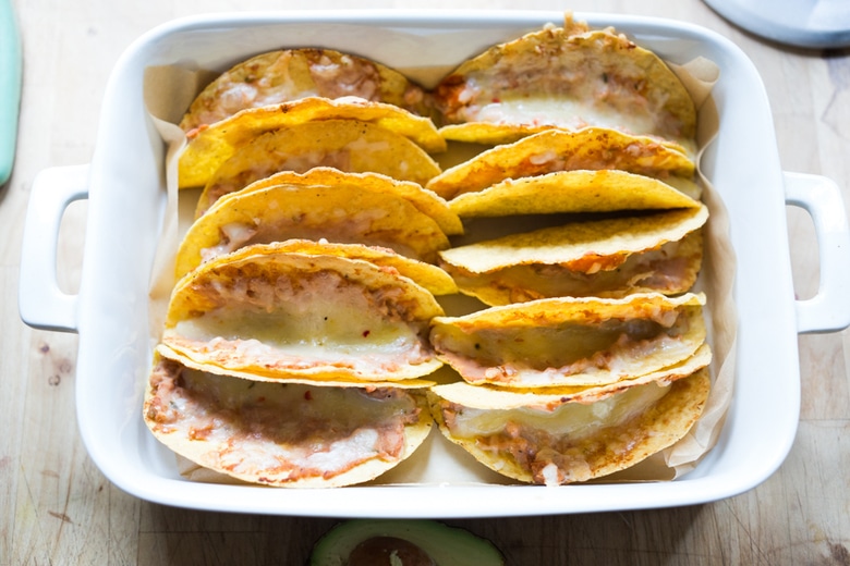 Healthy Baked Vegetarian Tacos - Kid friendly and just 15 minutes of prep before going into the oven to bake. | www.feastingathome.com